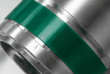 Green polyester masking tape applied around a metal component