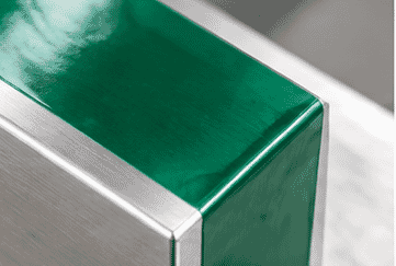 Close-up of green polyester tape masking a metal edge