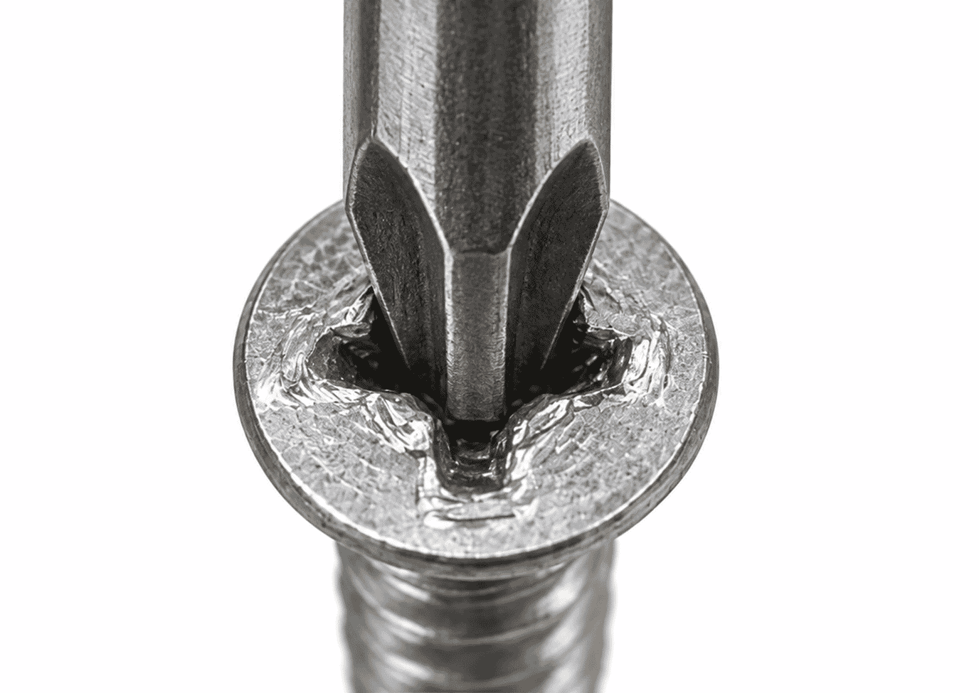 Larger screwdriver being used to remove a stripped screw